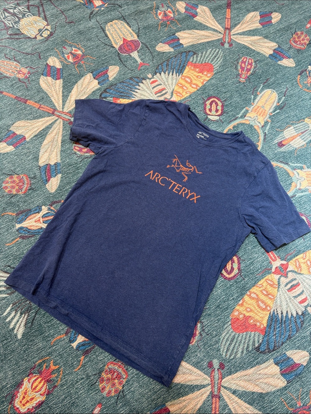 Arc'teryx Navy Heather bird T-Shirt with Orange Logo men’s M women’s M/L